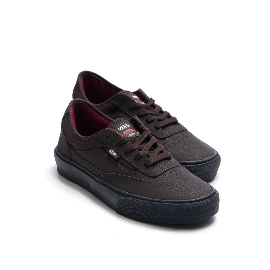 brown vans men's curren caples skateboard shoe with blue black soles
