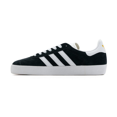 black suede adidas gazelle skate shoe with white stripes and a white sole