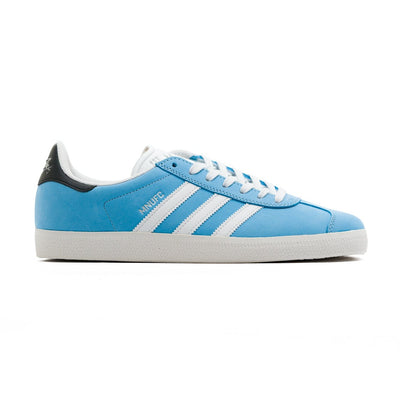 baby blue adidas gazella skate shoes in collaboration with famila skate shop and mnufc with white stripes and a white sole