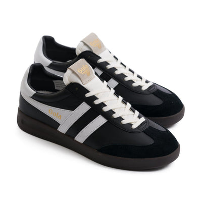 black gola men's shoe with white stripes and a gum sole