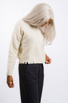 Grade and gather women's white distressed hem sweater top