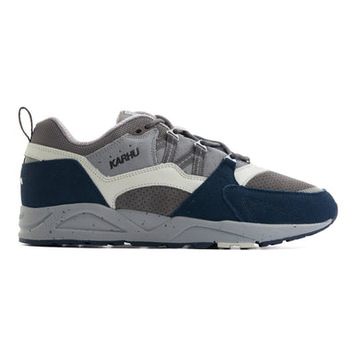 blue grey and white karhu men's comfort shoe with a grey speckled sole