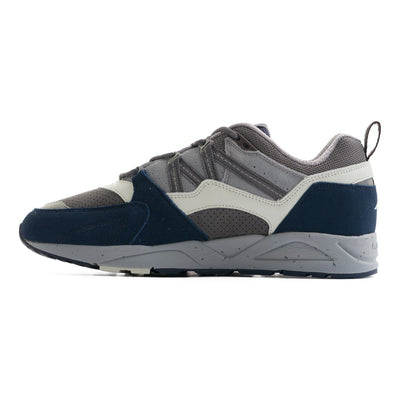 blue grey and white karhu men's comfort shoe with a grey speckled sole