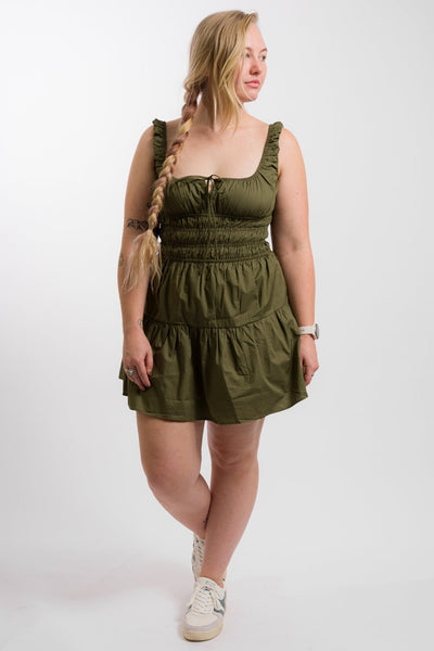 green sleeveless nia mini dress