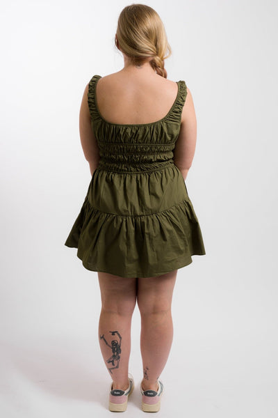 green sleeveless nia mini dress