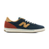 navy blue new balance numeric men's 440v2 with brown N, red heel, and white sole