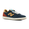 navy blue new balance numeric men's 440v2 with brown N, red heel, and white sole