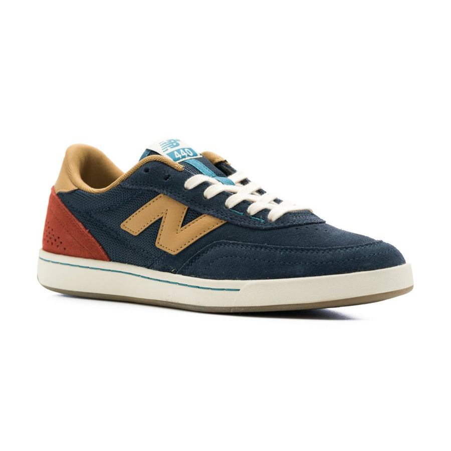 navy blue new balance numeric men's 440v2 with brown N, red heel, and white sole