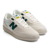 grey and white new balance men's shoe with grey sole and forest green detail