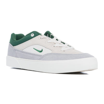 grey nike sb men's malor skate shoe with green detail and white sole