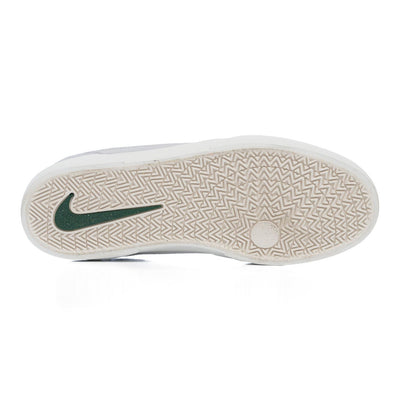 grey nike sb men's malor skate shoe with green detail and white sole