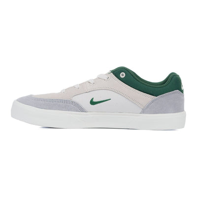 grey nike sb men's malor skate shoe with green detail and white sole