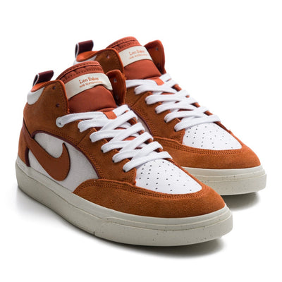 orange and white nike sb leo baker skate shoes