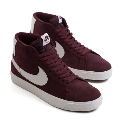 burgundy red nike high top with white sole