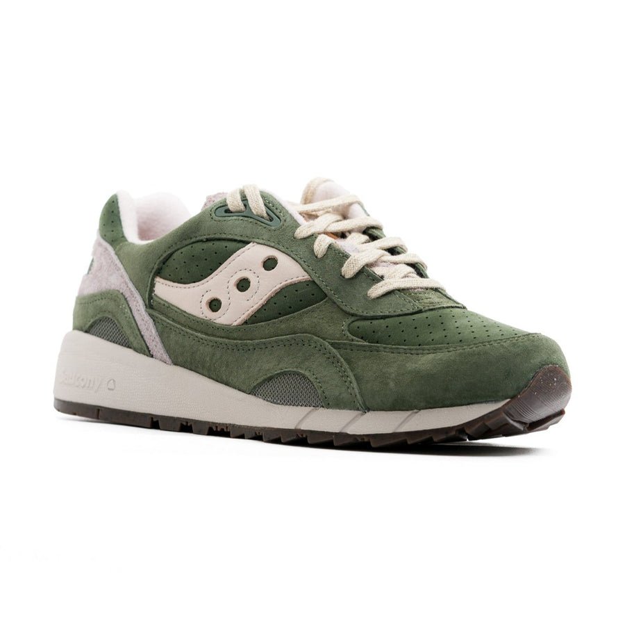 green men's saucony shadow 6000 with grey and cream details and an off white sole