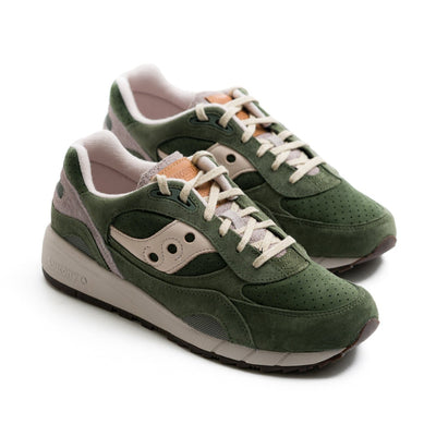 green men's saucony shadow 6000 with grey and cream details and an off white sole