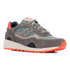 green and grey saucony shadow 6000 women'sand men's comfort shoe with green and orange detail and an off white sole