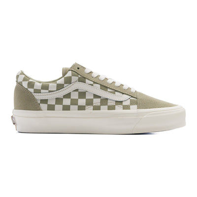 green and white checkerboard women's vans shoe with white sidestripe and white sole