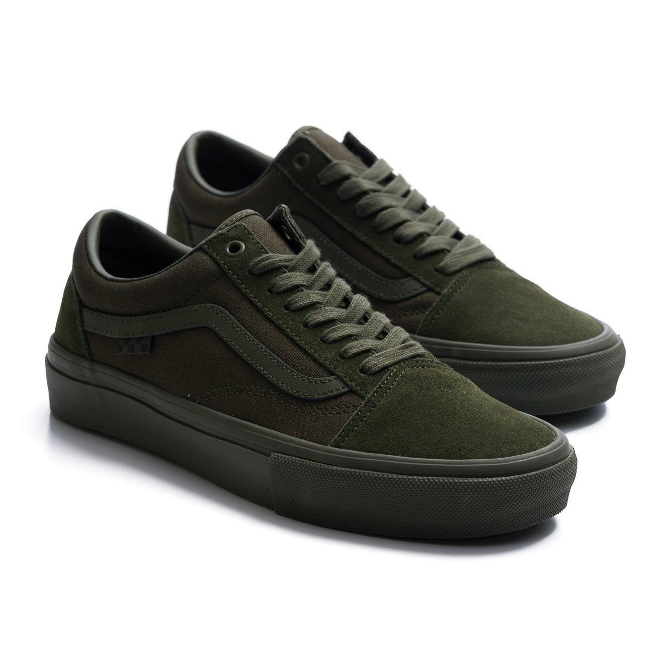 Dark green shops old skool vans