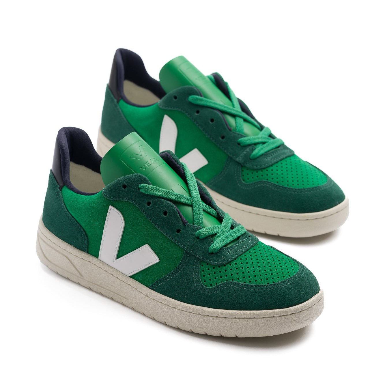 green veja women's v-10 sneakers with white logo and off white sole