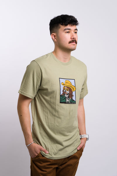 green volcom men's short sleeve tee shirt with mustached cowboy skeleton on the front