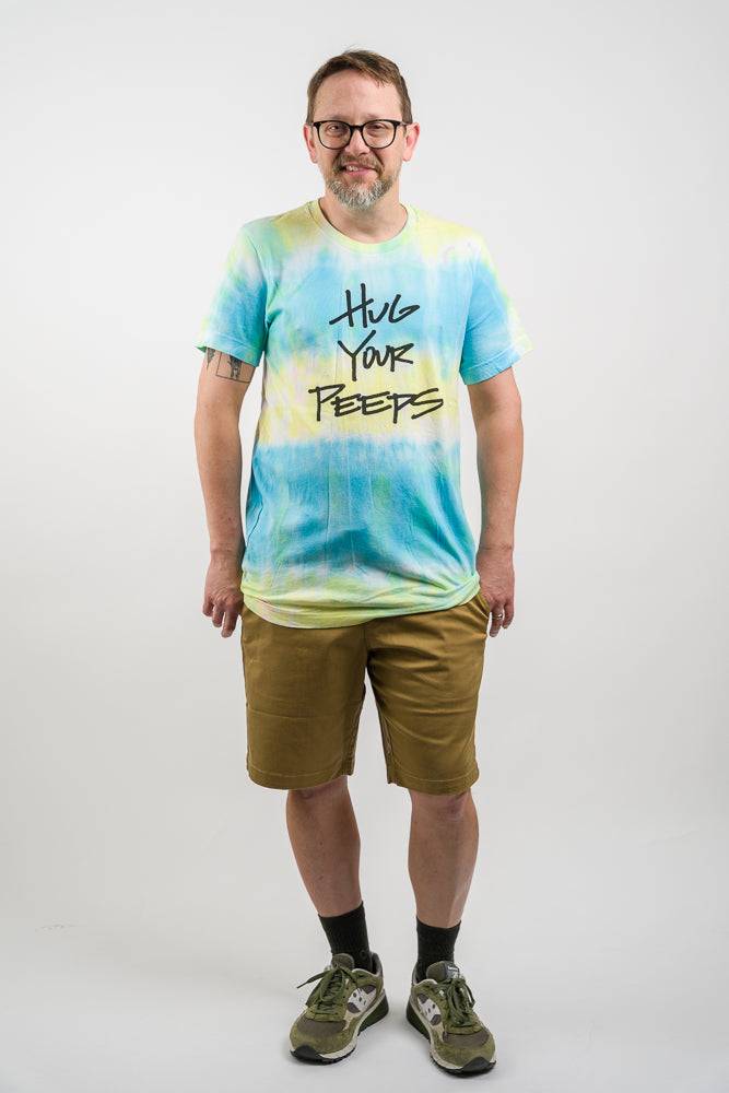 Hand Dyed tee shirt featuring the slogan Hug your peeps Tie Dye Tee