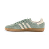 light green adidas samba adv with white stripes and a gum sole