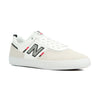 white men's new balance shoe with read and black details and a white sole