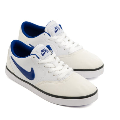 white nike sb kids check cnvs skate shoe with white sole and blue swoosh