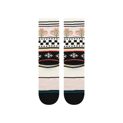 Pair of patterned stance women's crew socks with black, white, and multicolor design on a transparent background