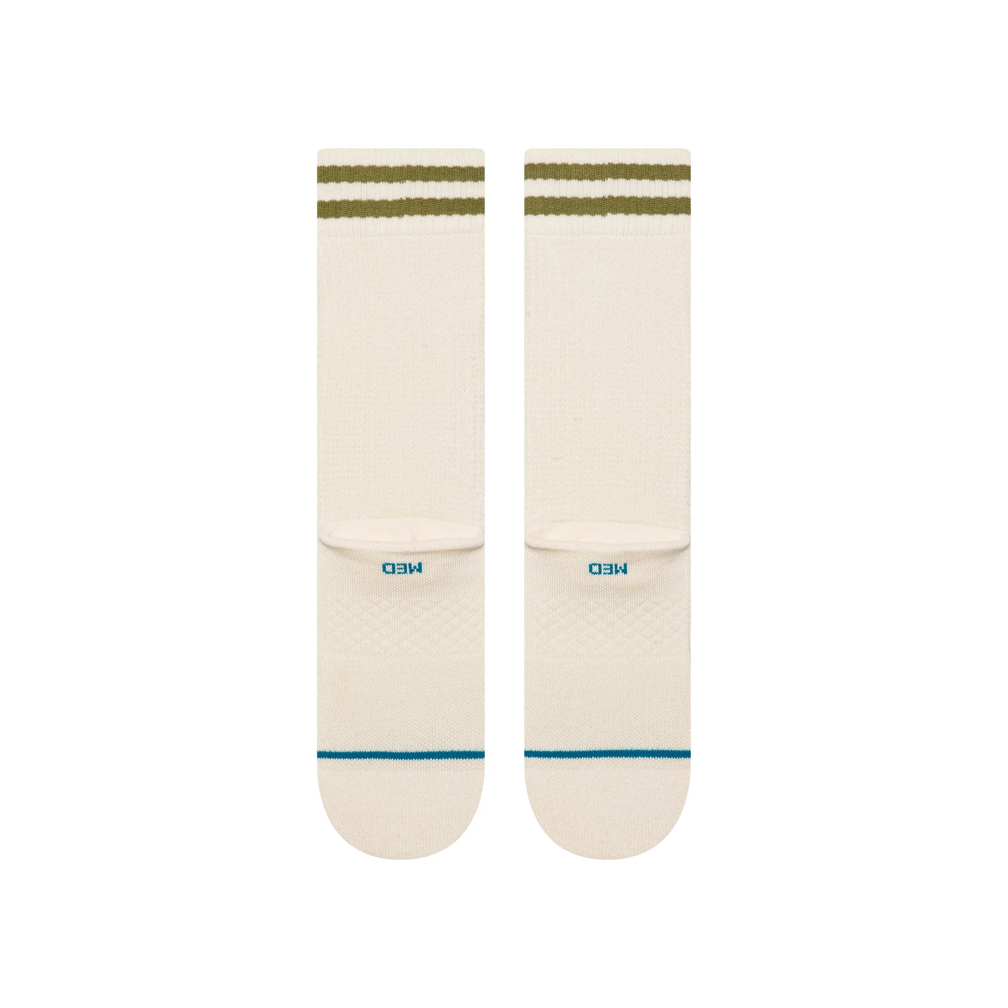Pair of cream stance women's butterblend crew socks with green stripes on a white background