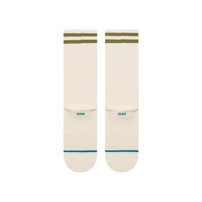 Pair of cream stance women's butterblend crew socks with green stripes on a white background