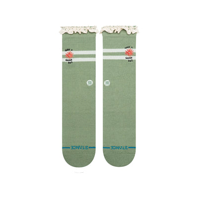 Green stance have a good day socks with white stripes and text on a white background