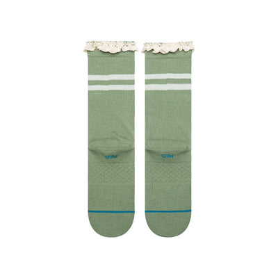 Green stance have a good day socks with white stripes and text on a white background