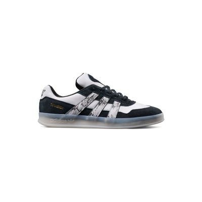 Black and white adidas x gustav tonnesen aloha sneaker with Adidas logo and a clear sole on a white background