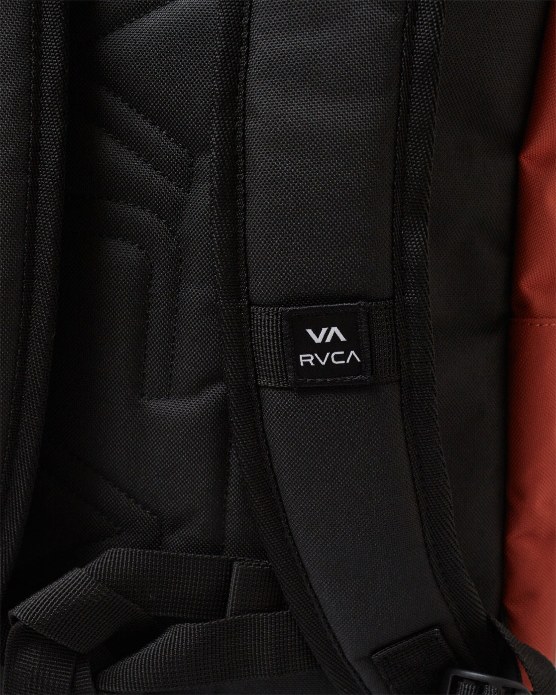 orange backpack with green front pocket rvca