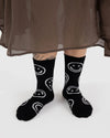 black Baggu Crew Sock with smiley faces