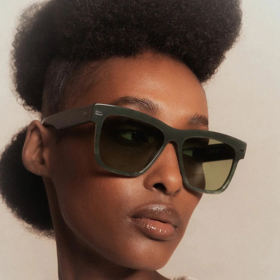 green optical grade sunglasses with green lenses
