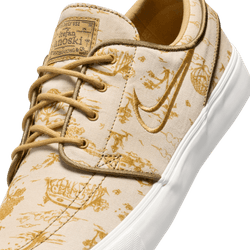 tan and gold city of style nike sb janoski low top men's skate shoe with all over print and white sole