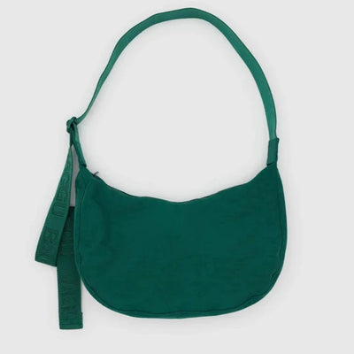 green nylon crescent shaped baggu bag