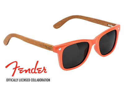 orange glassy and fender sunglasses colab with black lenses and pau ferro wood arms