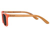 orange glassy and fender sunglasses colab with black lenses and pau ferro wood arms