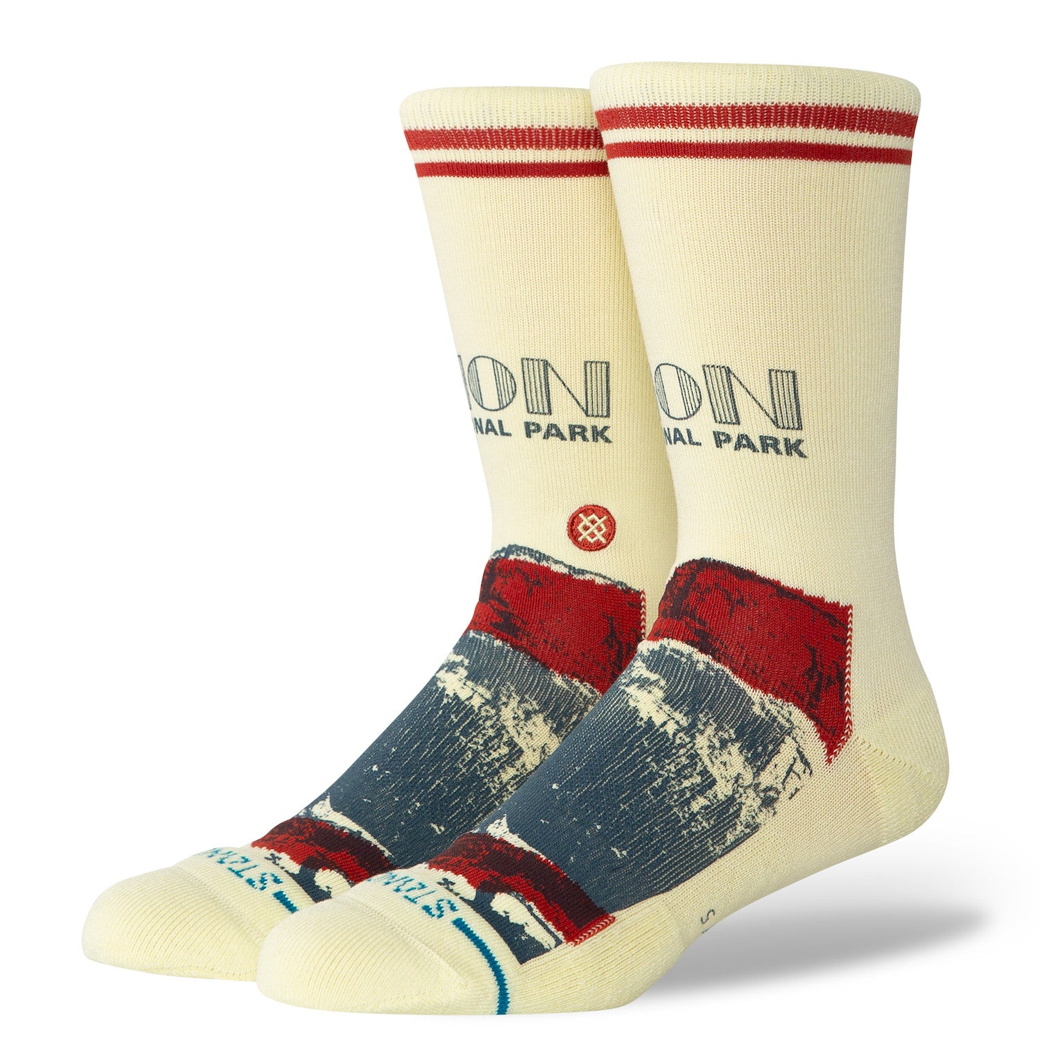 Pair of stance crew socks with red and blue zion national park design on a white background