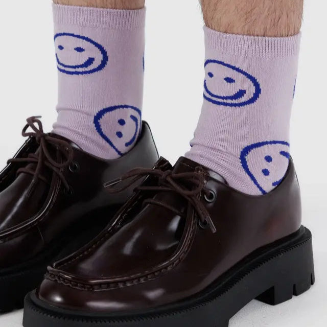 purple baggu crew socks with navy blue smiley faces
