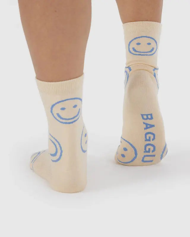 off white baggu crew sock with light blue smiley faces