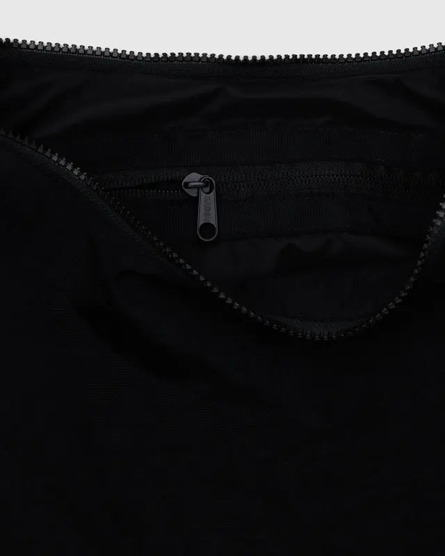 Black baggu medium nylon crescent shoulder bag on a light gray background