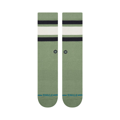 Pair of green stance men's boyd st crew socks with black and white stripes on a white background
