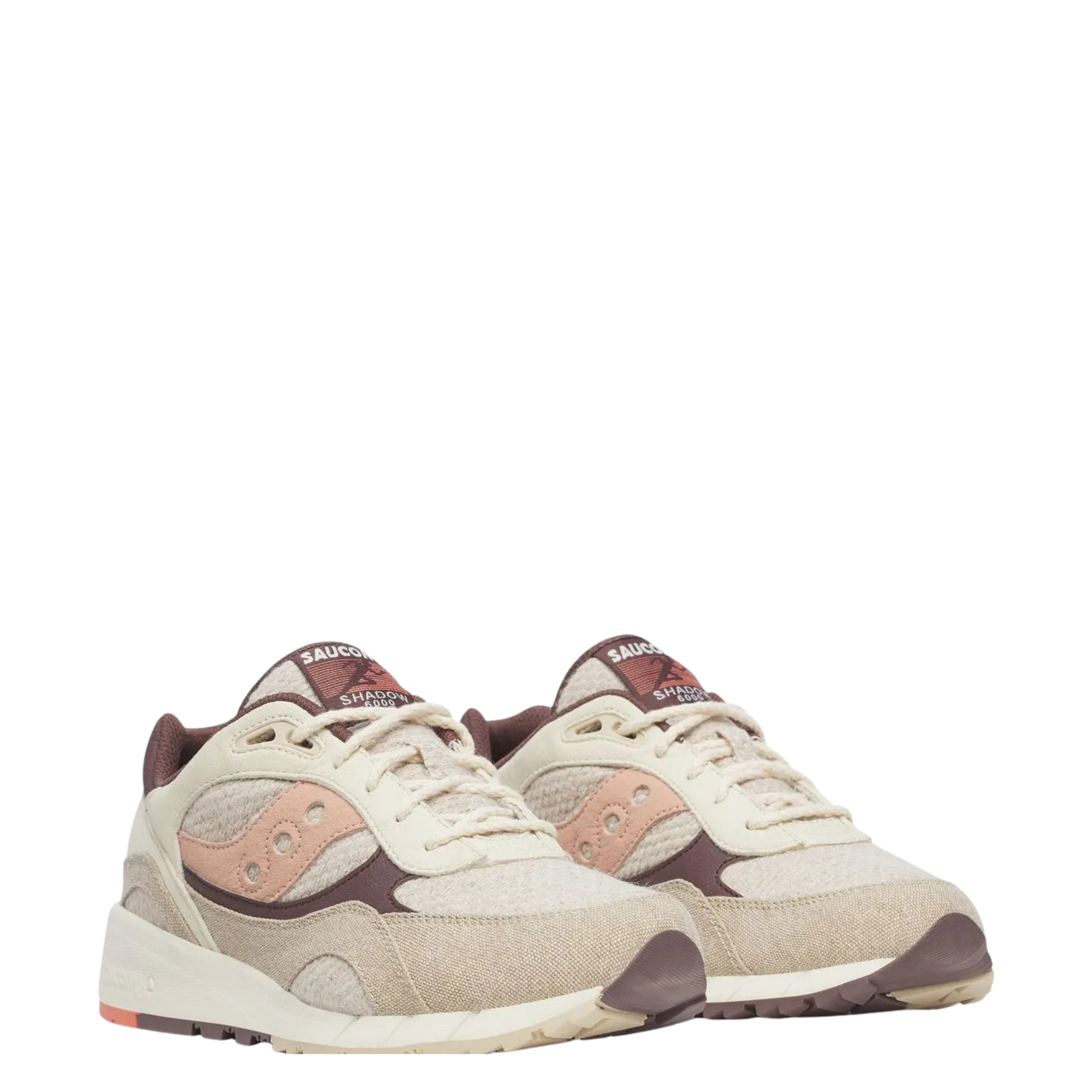 Beige saucony shadow 6000 women's sneaker with brown and pink accents on a white background