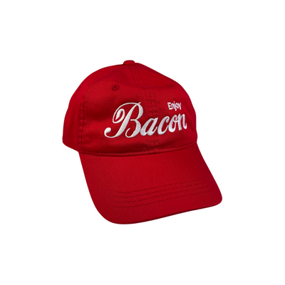 Red cap with 'Enjoy Bacon' text on a white background