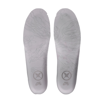 insole of the Nike sb x Yuto Air Force 1 Low skateboard sneakers in light gray and dark gray, featuring a light gray leather upper, dark gray Swoosh, and a cream midsole with a black outsole.